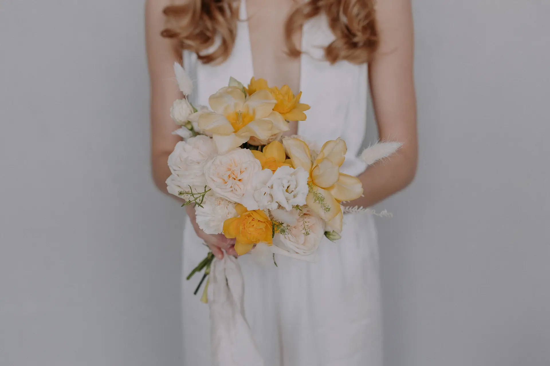 Bridal bouquet with yellow and white flowers