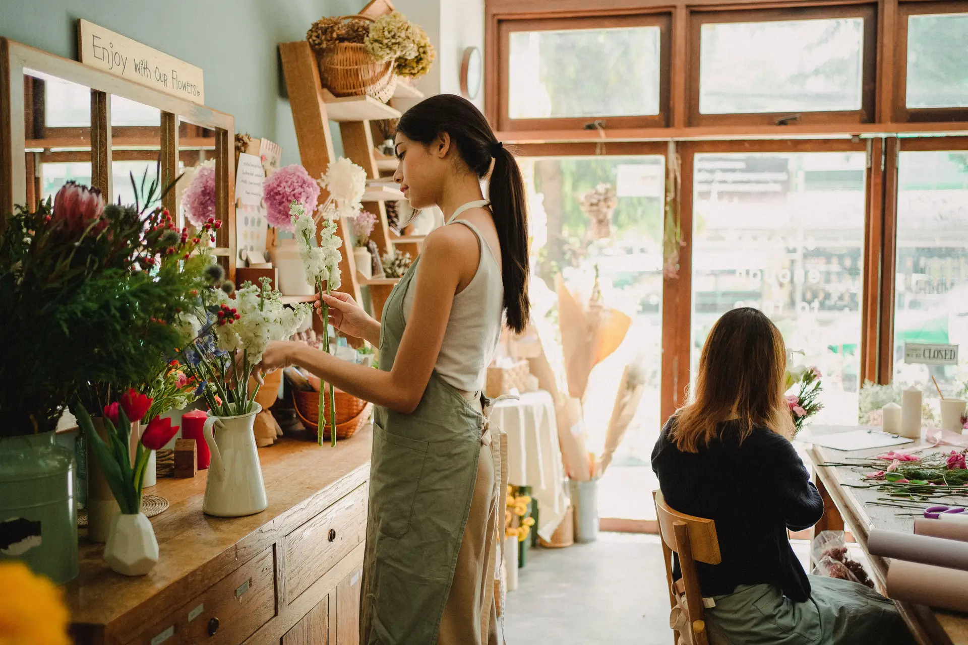 Florists working in WhiteBloomAtelier studio